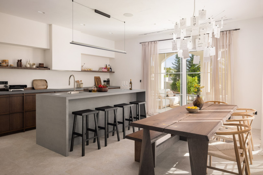 Adjacent is a fully outfitted 30-square-meter kitchen with premium appliances