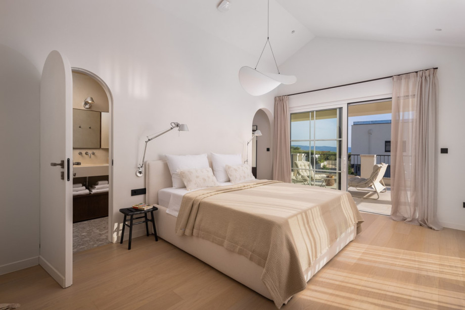 The villa’s sleeping quarters are distinctly elegant and spacious