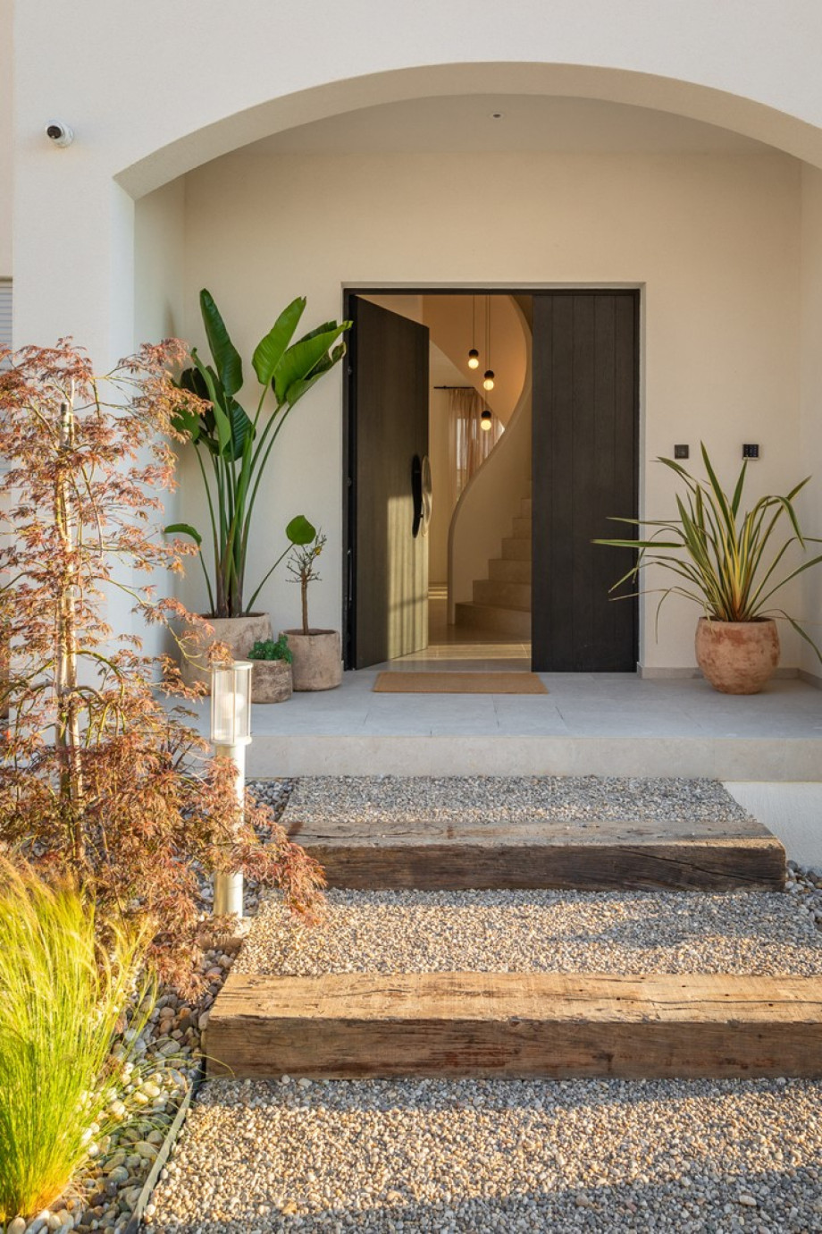 A stylish and inviting entrance showcases the property's elegance, offering a graceful welcome from the moment you arrive