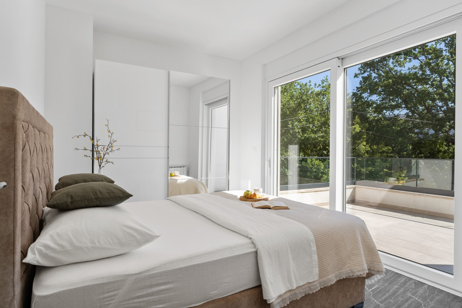 Bedroom No. 3 has a 180cm x 200cm king-size bed, air conditioning, en-suite shower bathroom, and a terrace