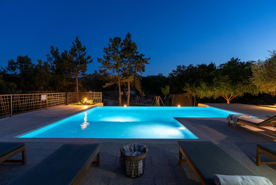 Stunning 58 sqm infinity pool provides ample space for relaxation and fun.