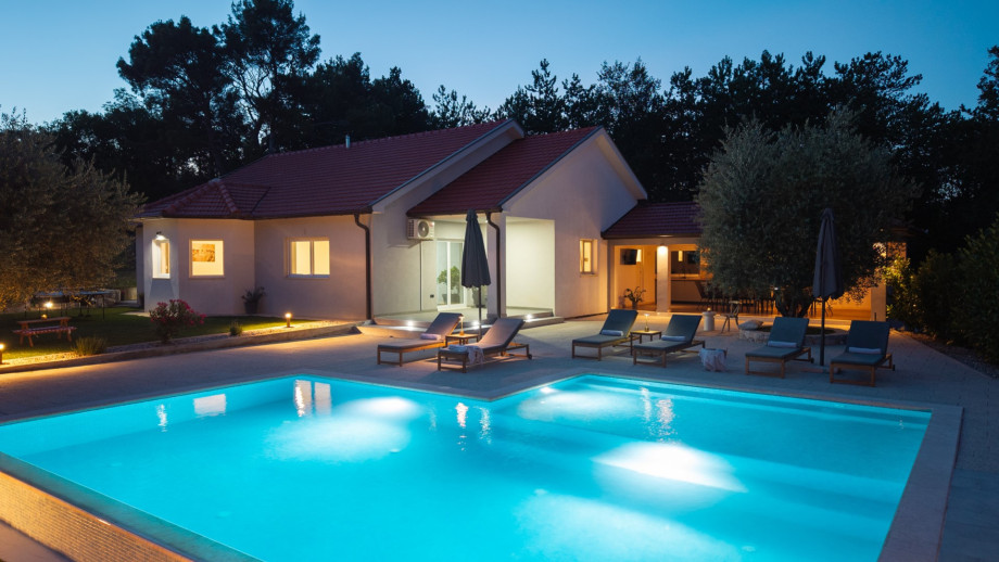 Large 58 sqm infinity pool designed for relaxing holiday.