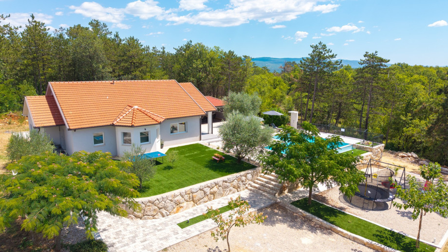 Villa is nestled on a generous 3000 sqm private plot.