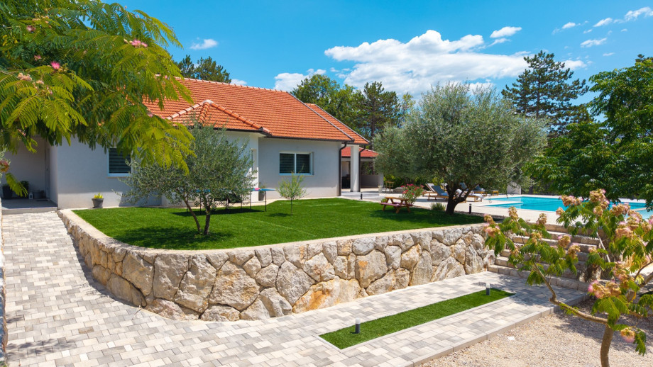 The 3000 sqm plot is nestled in a tranquil village setting.