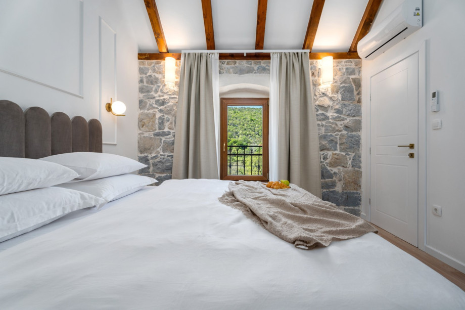 Bedroom NO2 (13sqm) with air-conditioning, and a TV