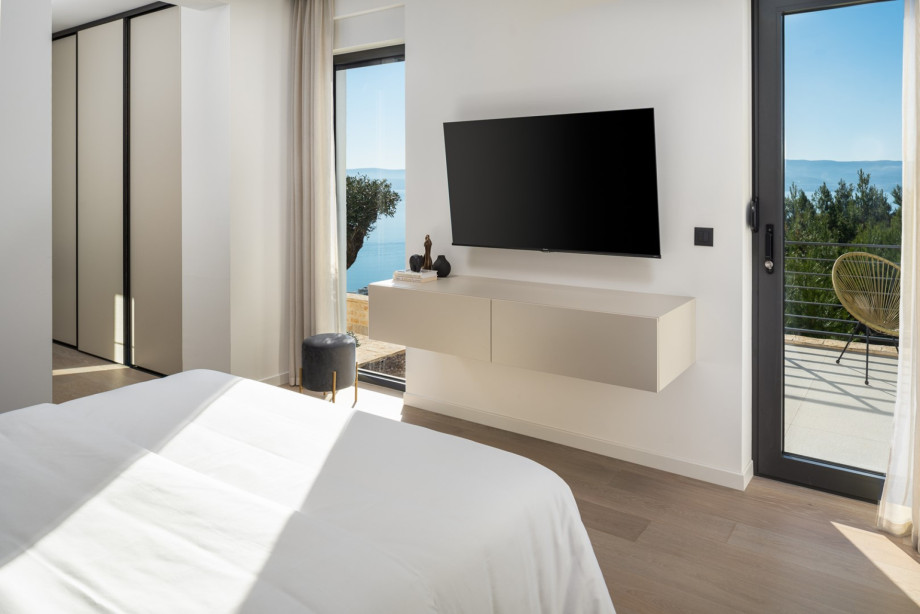 Schlafzimmer Nr. 4 mit TV und Klimaanlage, Meerblick