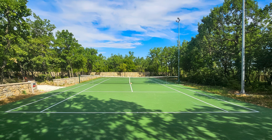 Stay active and enjoy a match on your private tennis court, just steps away from the villa
