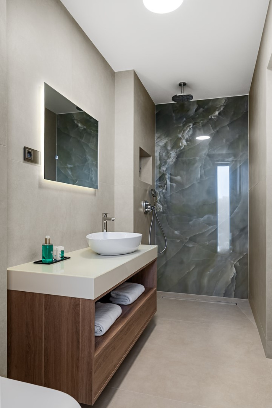 Dedicated en-suite bathrooms with modern walk-in showers for every bedroom.