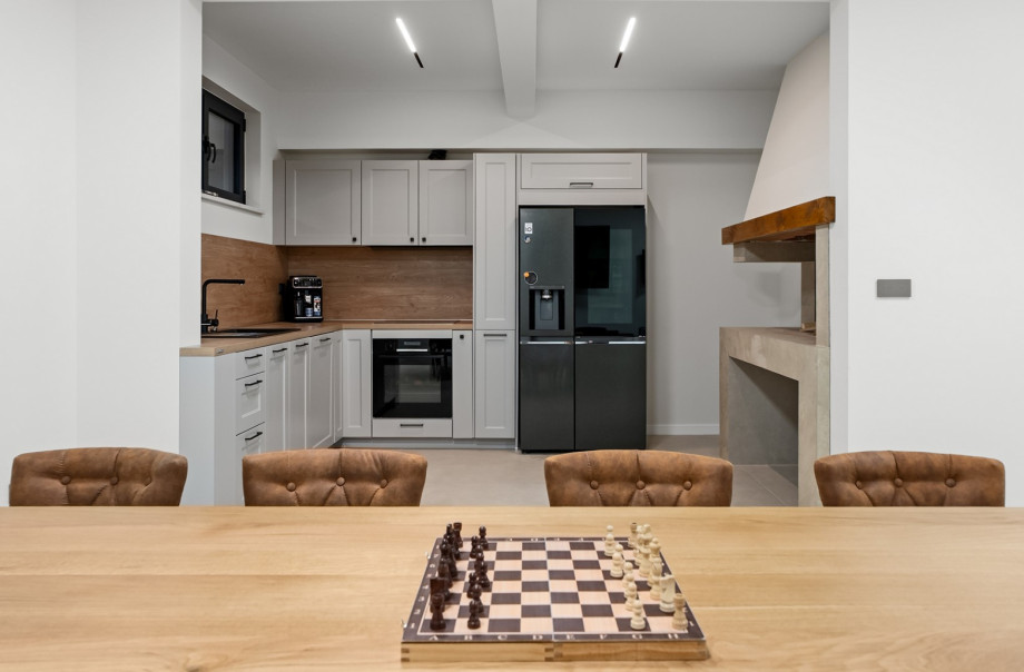 Lower level includes an additional 42 m2 indoor dining zone with its own kitchen.