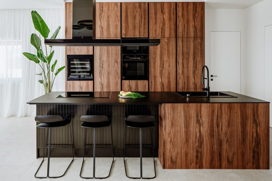 The kitchen island has all the amenities a modern guest needs.