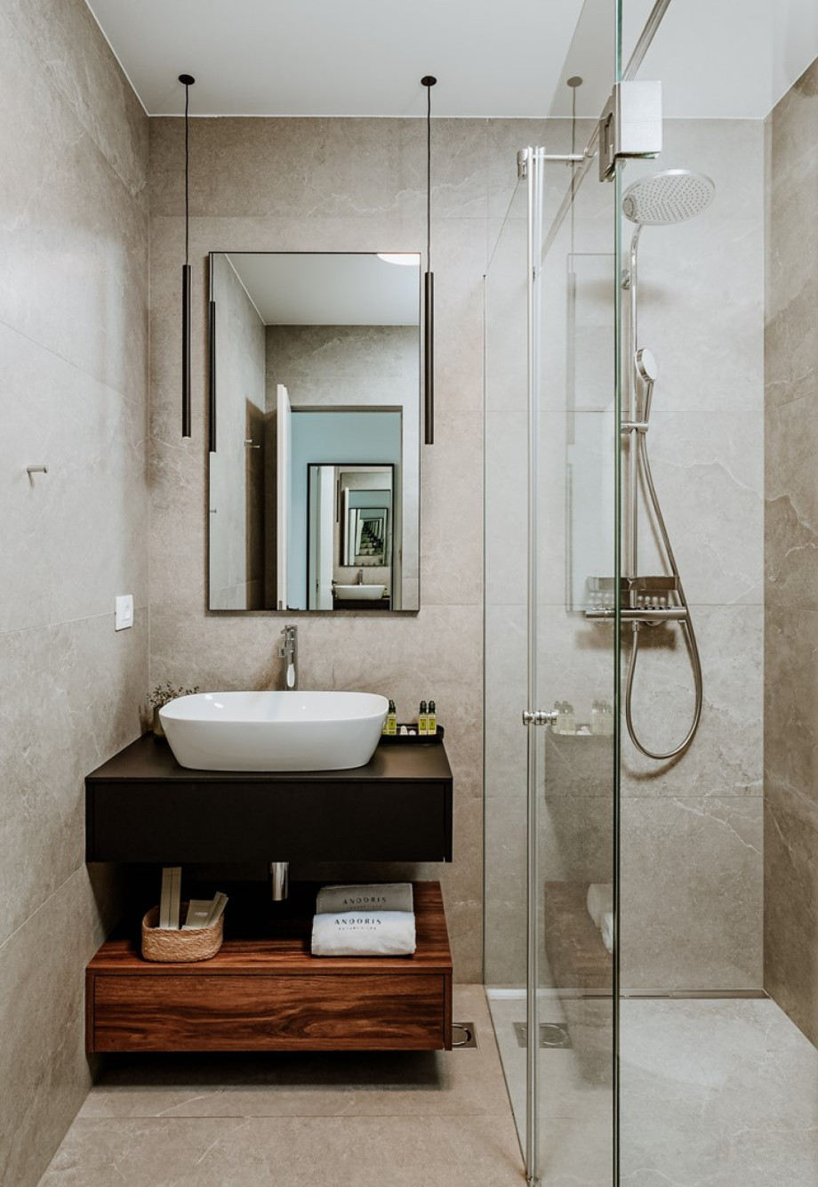 En-suite bathroom with a shower, and amazing views of the sea.