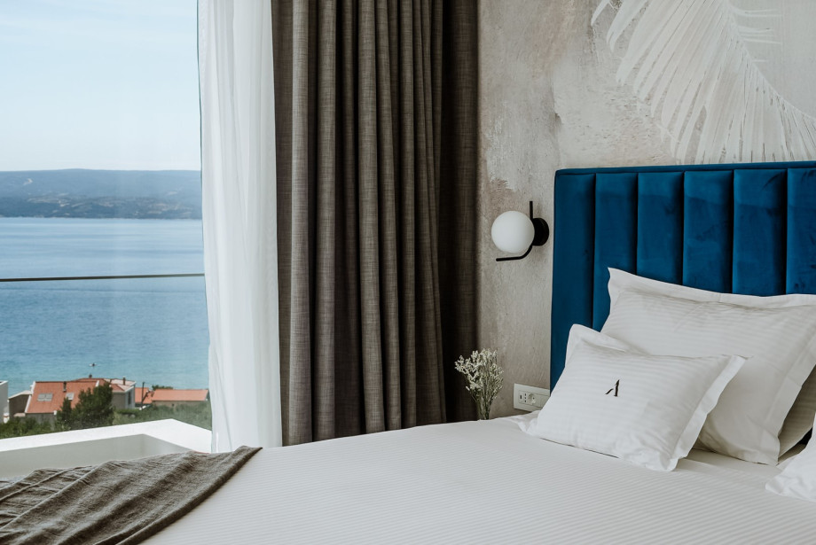 Bedroom No2 (22 sqm) with a king-size bed 180cm x 200cm, A/C, TV.