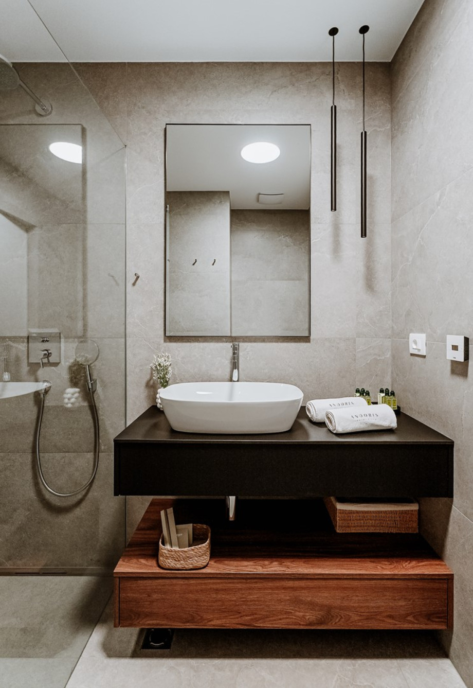 En-suite bathroom with a shower, and amazing views of the sea.