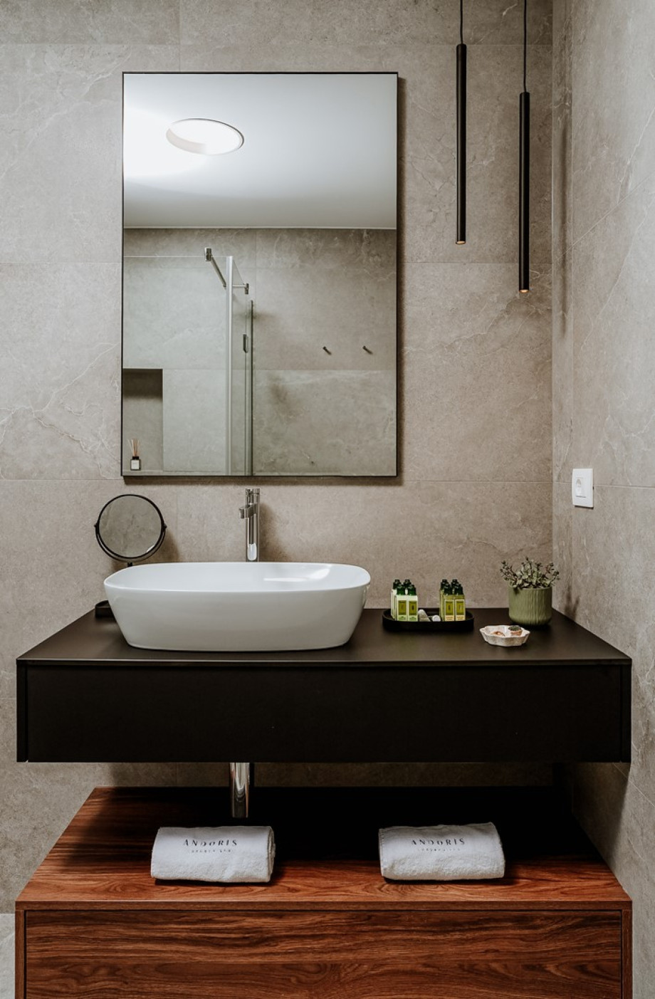 En-suite bathroom with a shower and sea views.