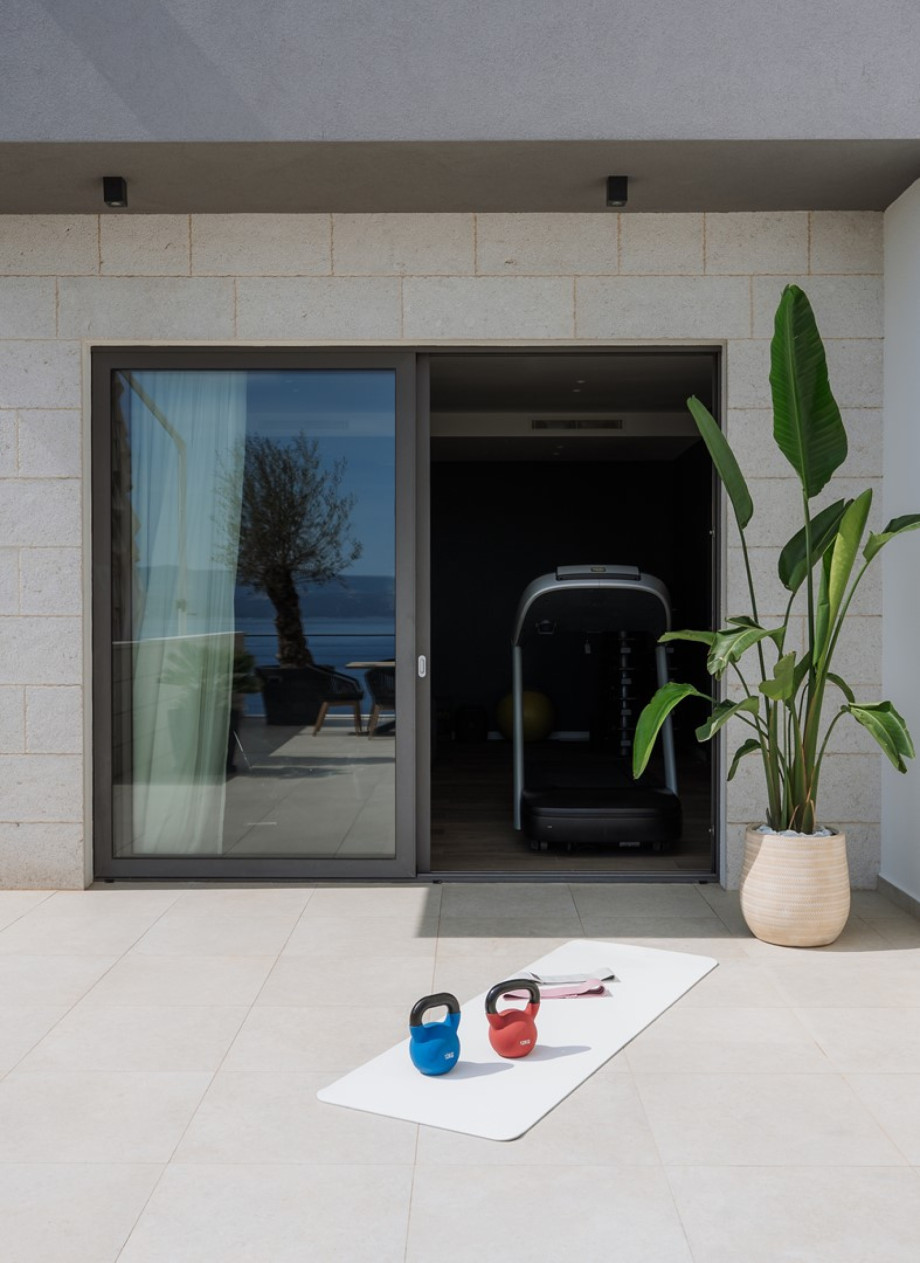 The pool area can be directly approached from the Media room